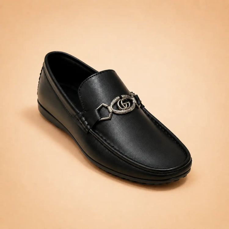 Regal Crest men’s black leather loafer with metal detail – front view